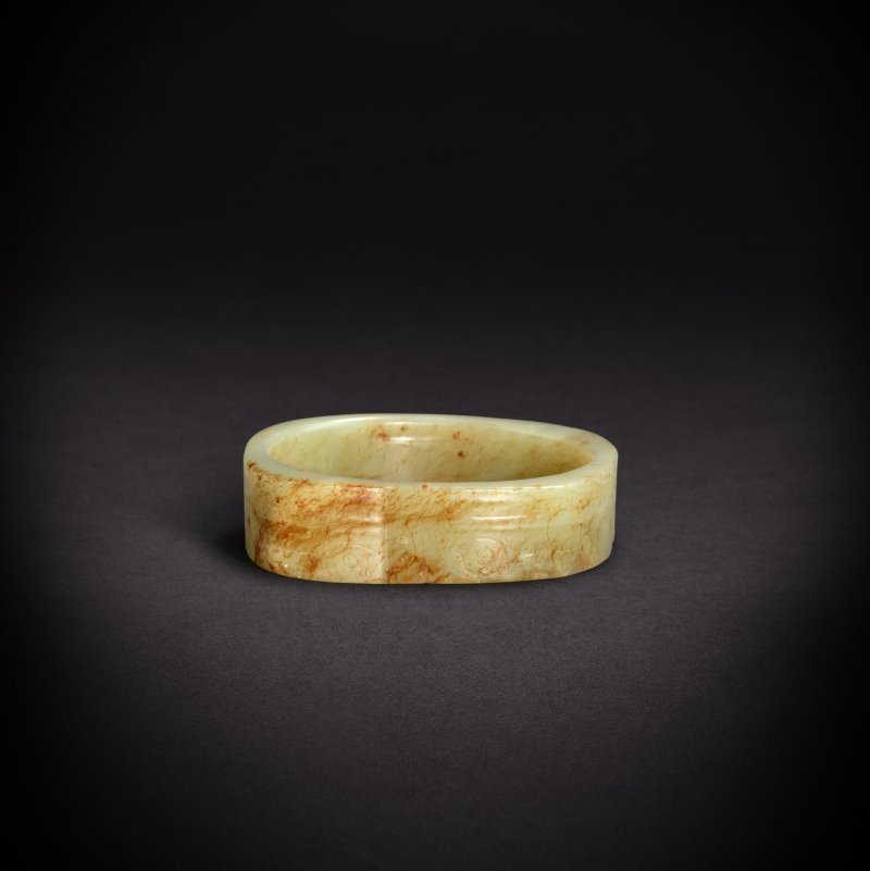 A yellowish-celadon jade 'mask-多宝古瓷宝典