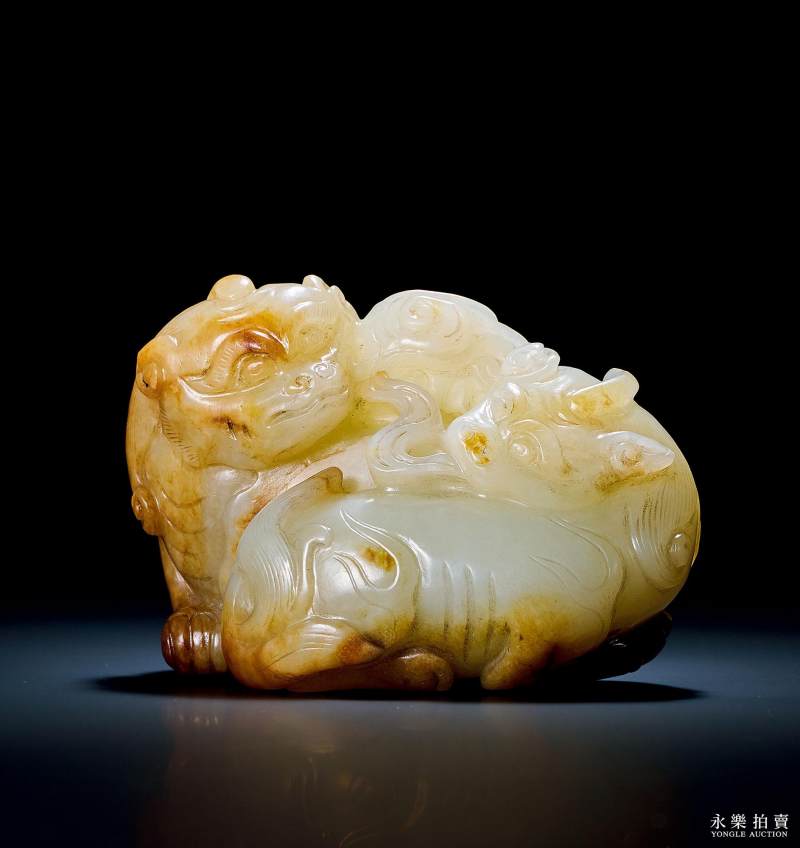 明 白玉沁色双兽