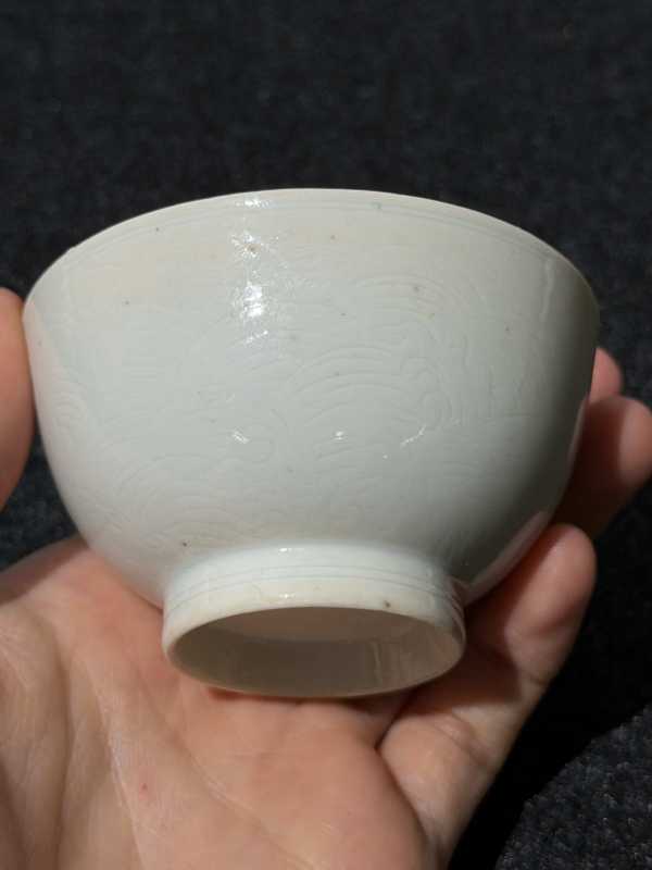 清早期 白釉暗刻海水江崖纹杯一对 - 图10