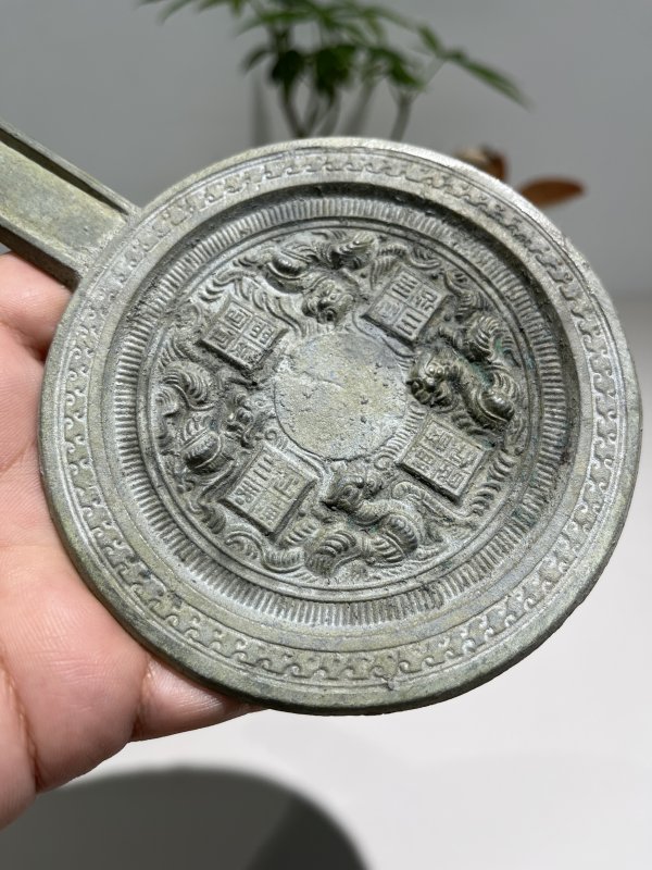 明 四兽方枚纹手柄镜 - 图4