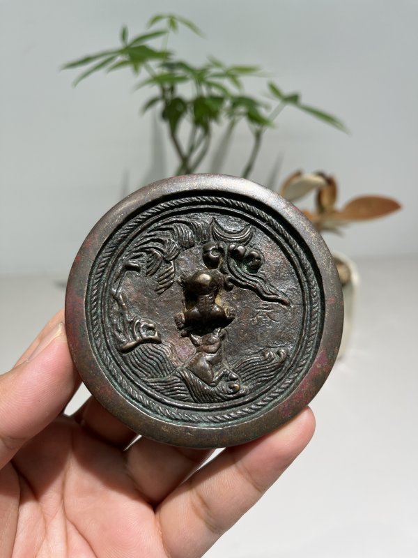 明 瑞兽钮犀牛望月纹镜 - 图2