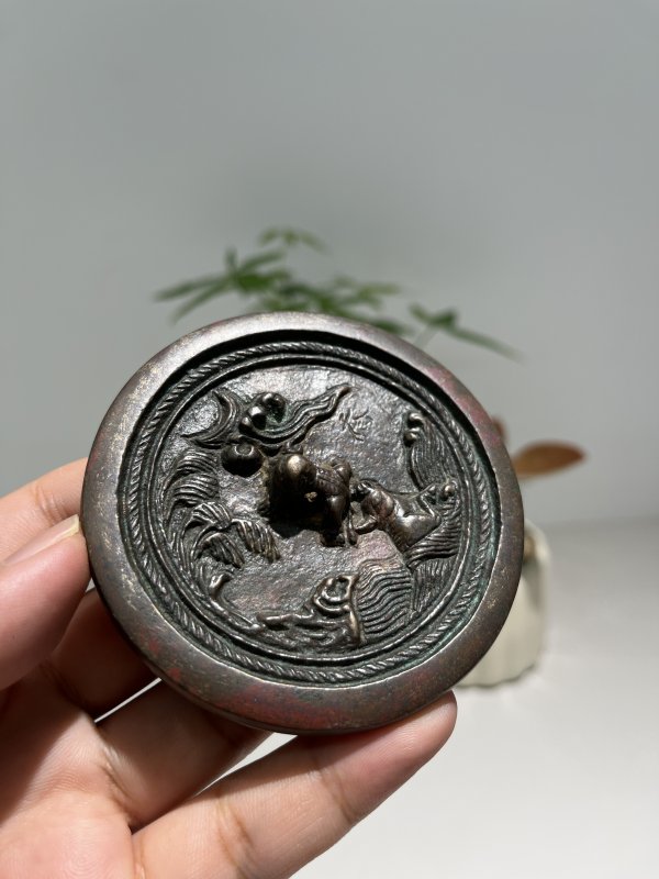明 瑞兽钮犀牛望月纹镜 - 图6
