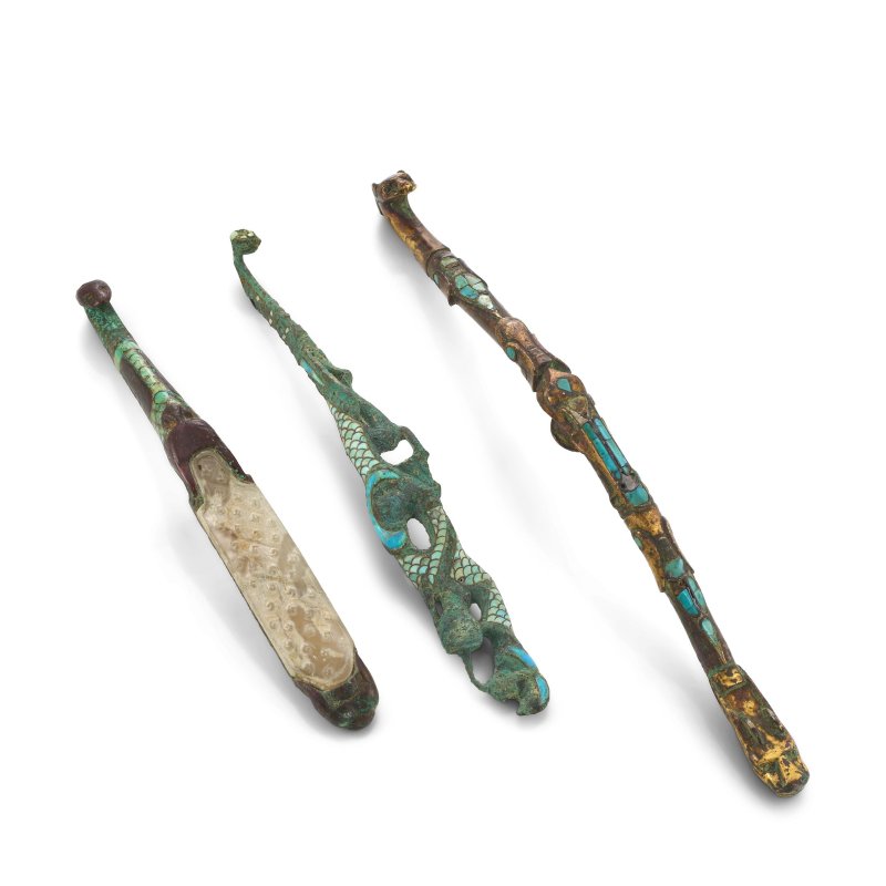戰國/漢 青銅及鎏金銅嵌松石嵌玉帶鈎三件 | THREE TURQUOISE-INLAID AND JADE-INSET BRONZE AND GILT BRONZE BELT HOOKS