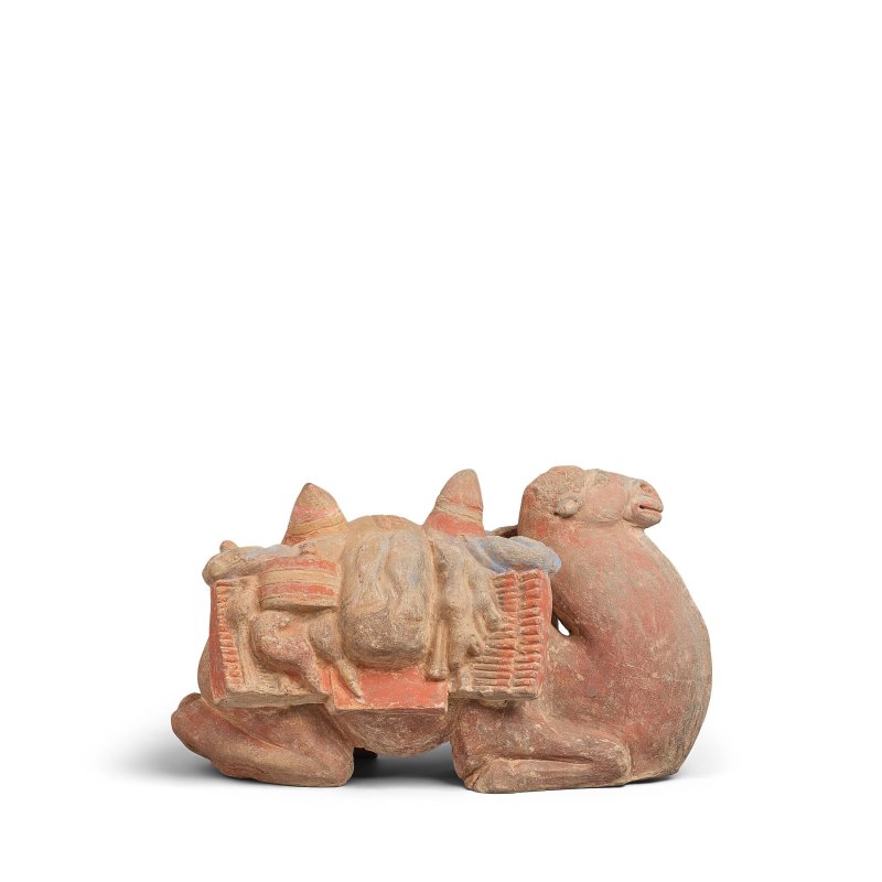 二十世紀仿北齊 加彩陶載貨臥駝 | A PAINTED POTTERY FIGURE OF A RECUMBENT LADEN CAMEL