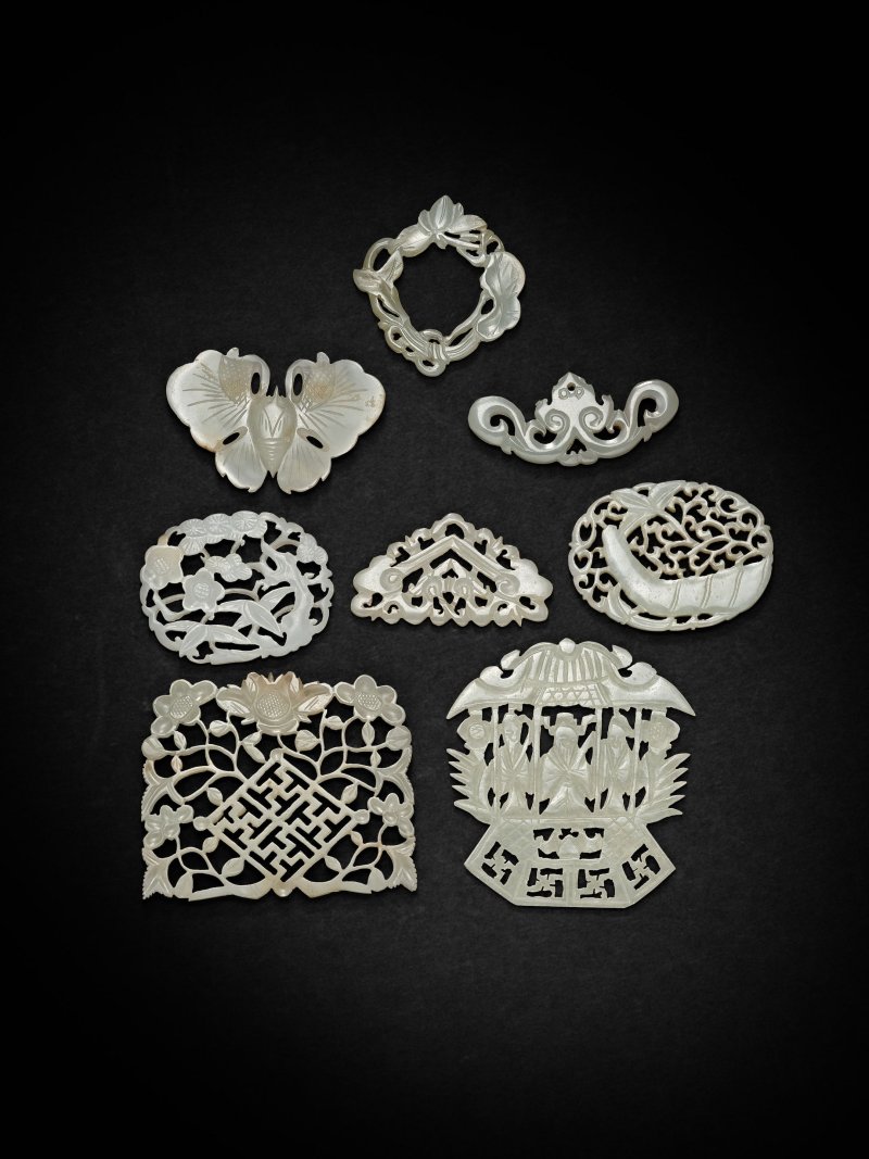 清　玉透雕飾件一組八件 | A GROUP OF EIGHT RETICULATED JADE ORNAMENTS