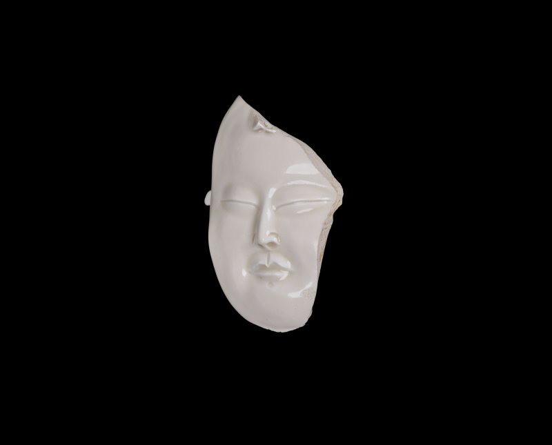 宋 定窯白釉嬰童殘片 | A FRAGMENT OF A 'DING' BOY FIGURE