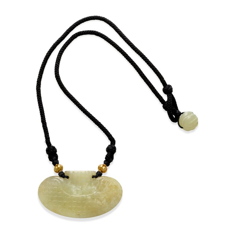 清 青白玉雕荷包形墜 | A CARVED PALE CELADON JADE 'POUCH' PENDANT