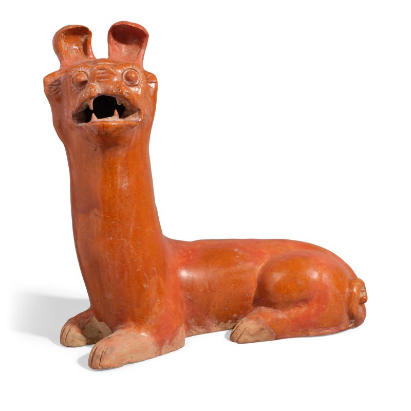 漢 褐釉臥犬 | A BROWN-GLAZED POTTERY DOG