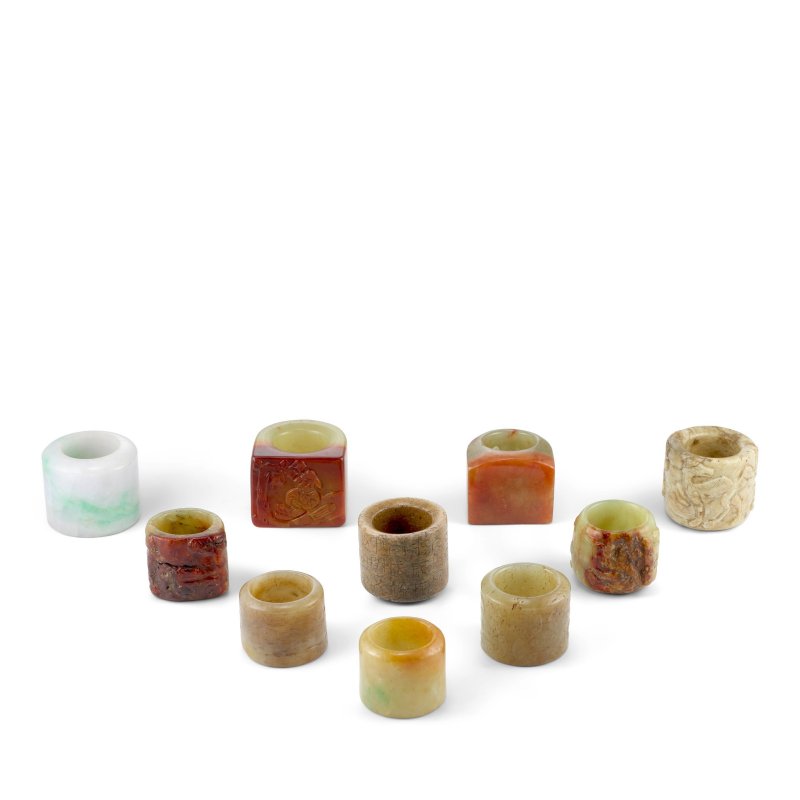 清及更晚 玉及石料扳指十枚 | A GROUP OF TEN JADE AND HARDSTONE ARCHER'S RINGS