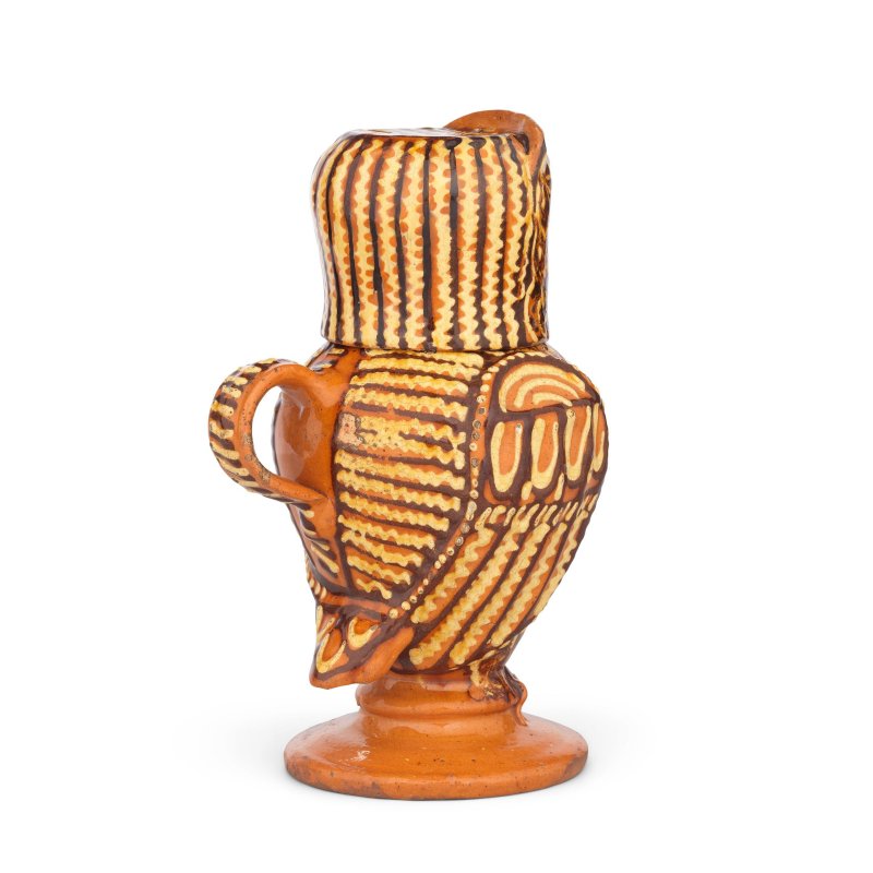 A remarkable Staffordshire slipware owl jug and cover, circa 1690-1710 - 图5