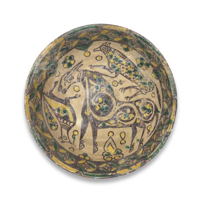 A Nishapur buffware pottery bowl