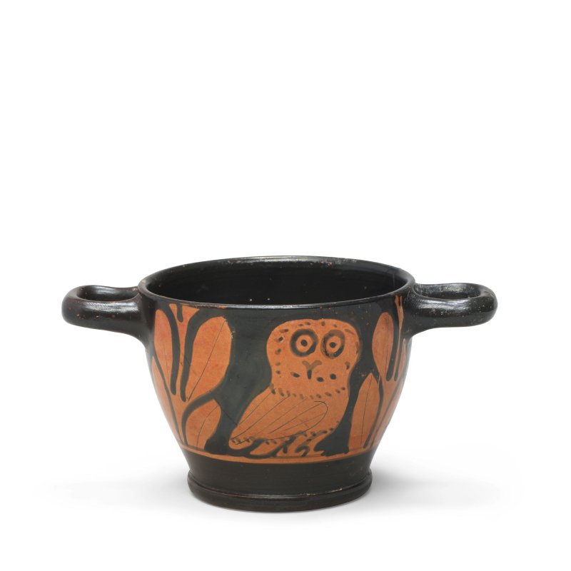 A Greek red-figure owl skyphos