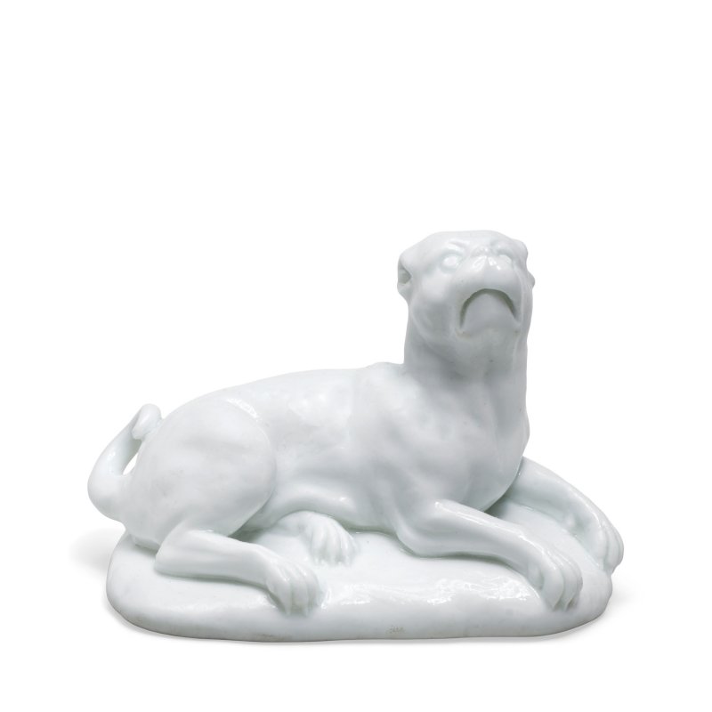 A French soft-paste white reclining pug dog, circa 1740