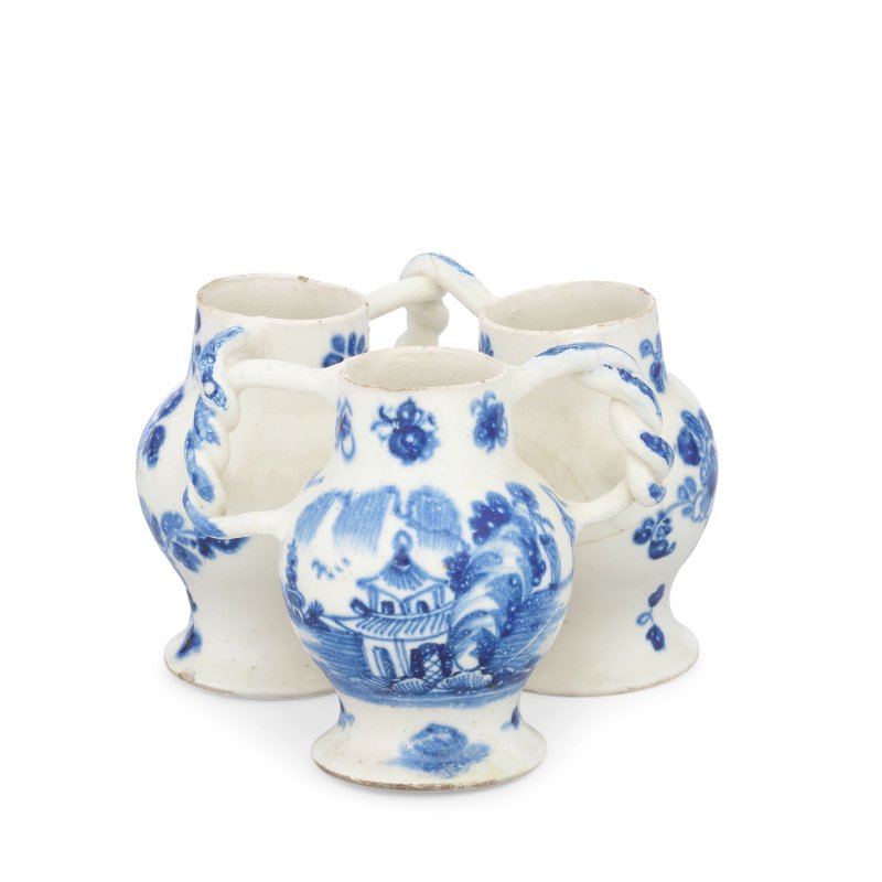 A highly significant Bovey Tracey porcelain fuddling cup, circa 1767