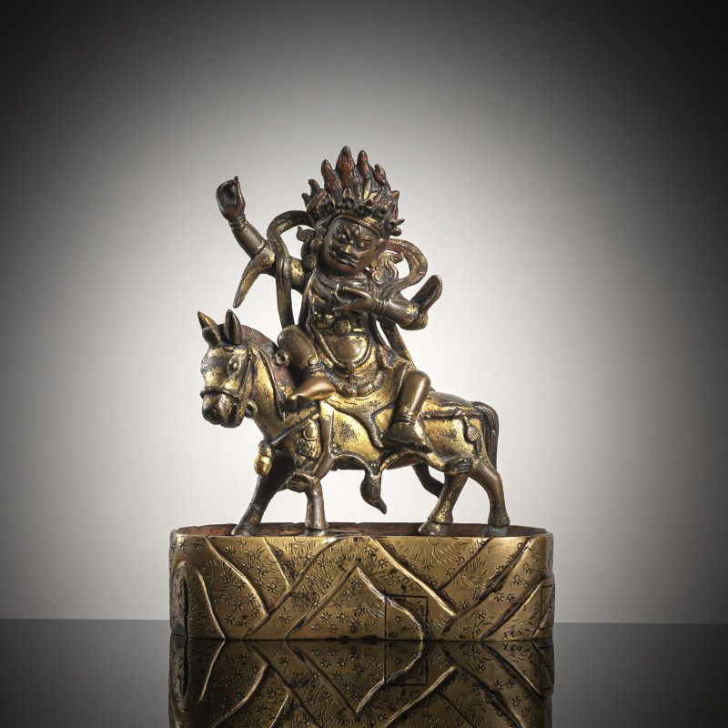 A GILT-BRONZE FIGURE OF SHRI DEVI