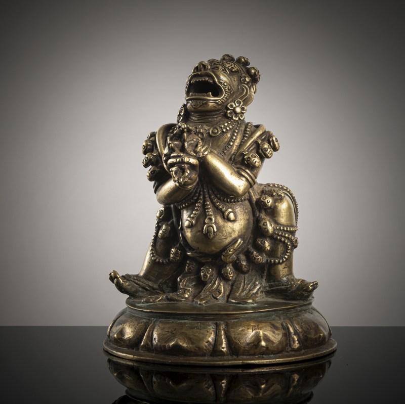 A BRONZE FIGURE OF DHAKA