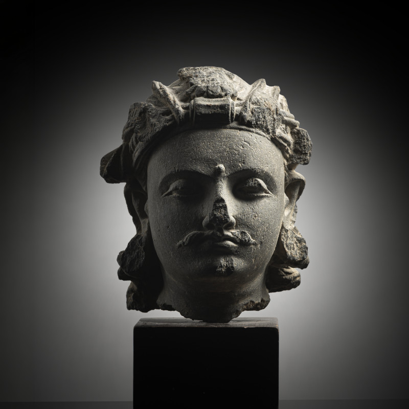 A GREY SCHIST HEAD OF A BODHISATTVA