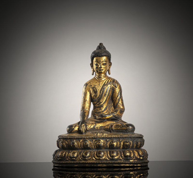 A GILT-BRONZE FIGURE OF BUDDHA SHAKYAMUNI
