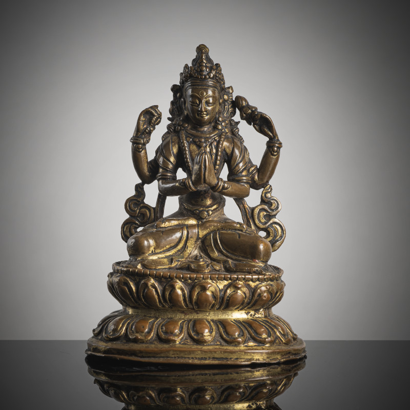 A gilt-bronze figure of Shadaksharilokeshvara