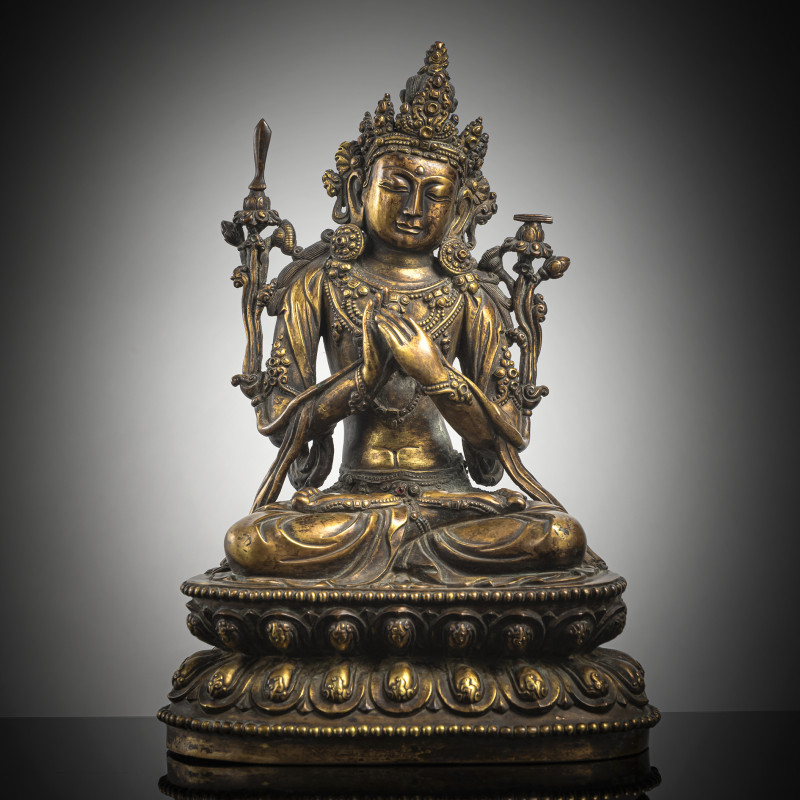 A GILT-BRONZE FIGURE OF MANJUSHRI