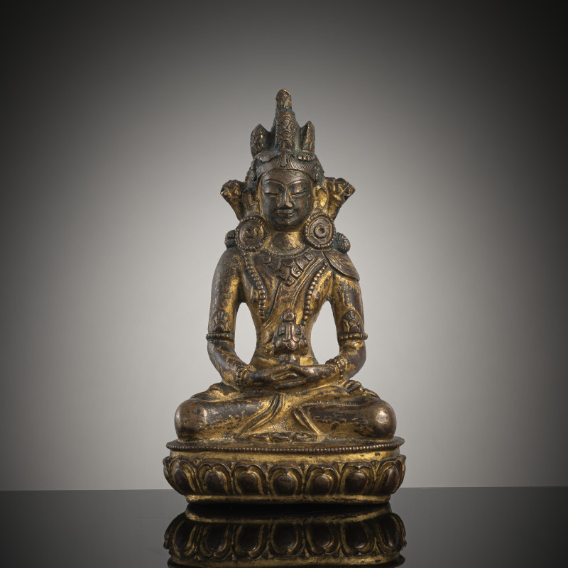 A GILT-BRONZE FIGURE OF AMITAYUS