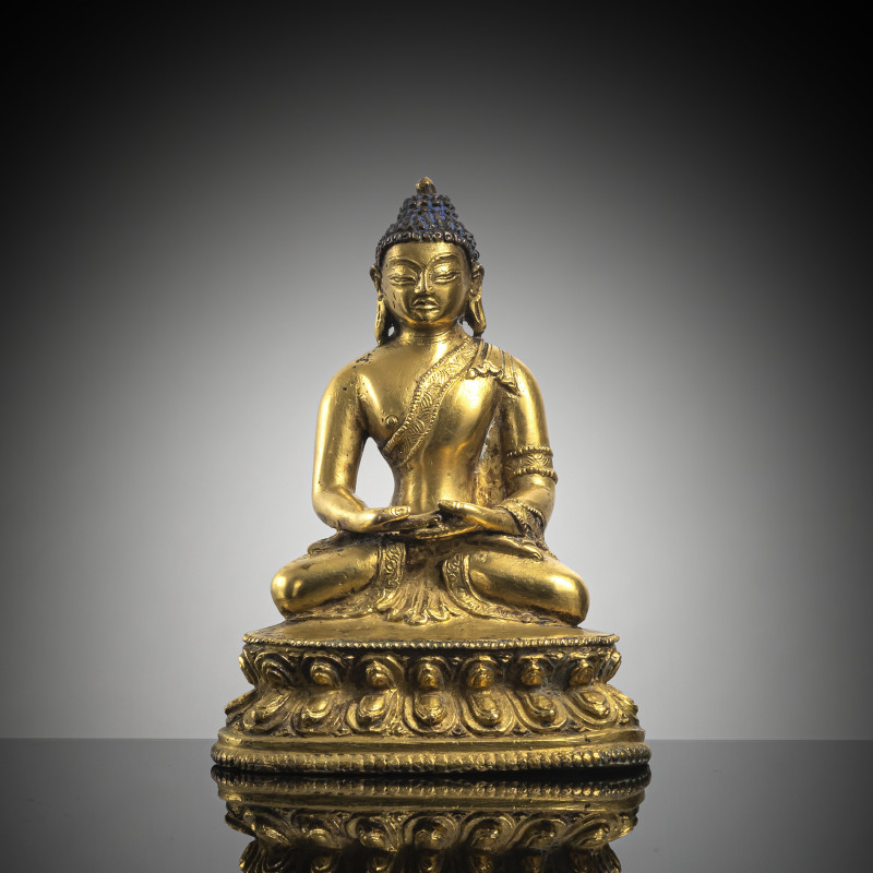 A GILT-BRONZE FIGURE OF BUDDHA SHAKYAMUNI