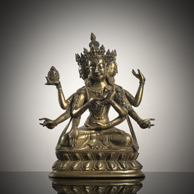 A BRONZE FIGURE OF USHNISHAVIJAYA