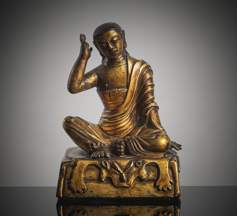 A GILT-LACQUERED TERRACOTTA FIGURE OF MILAREPA
