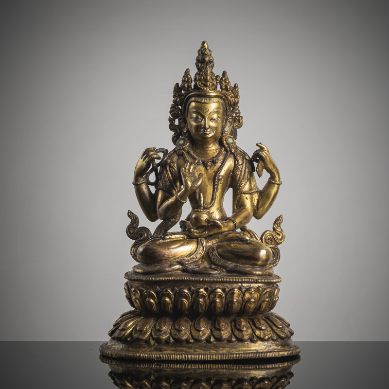 A GILT-COPPER FIGURE OF MANJUGOSHA