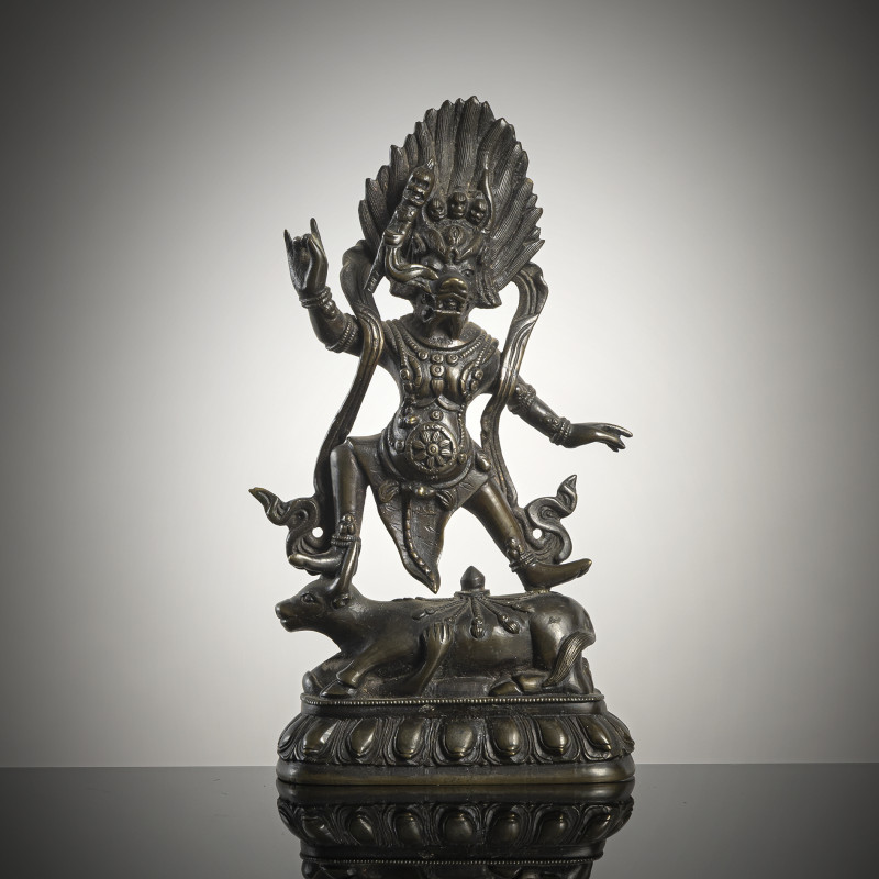 Bronze of Yama on a bull above a lotus throne