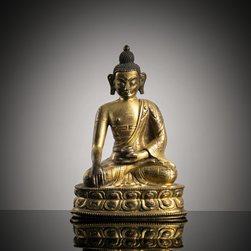 A GILT-BRONZE FIGURE OF BUDDHA SHAKYAMUNI
