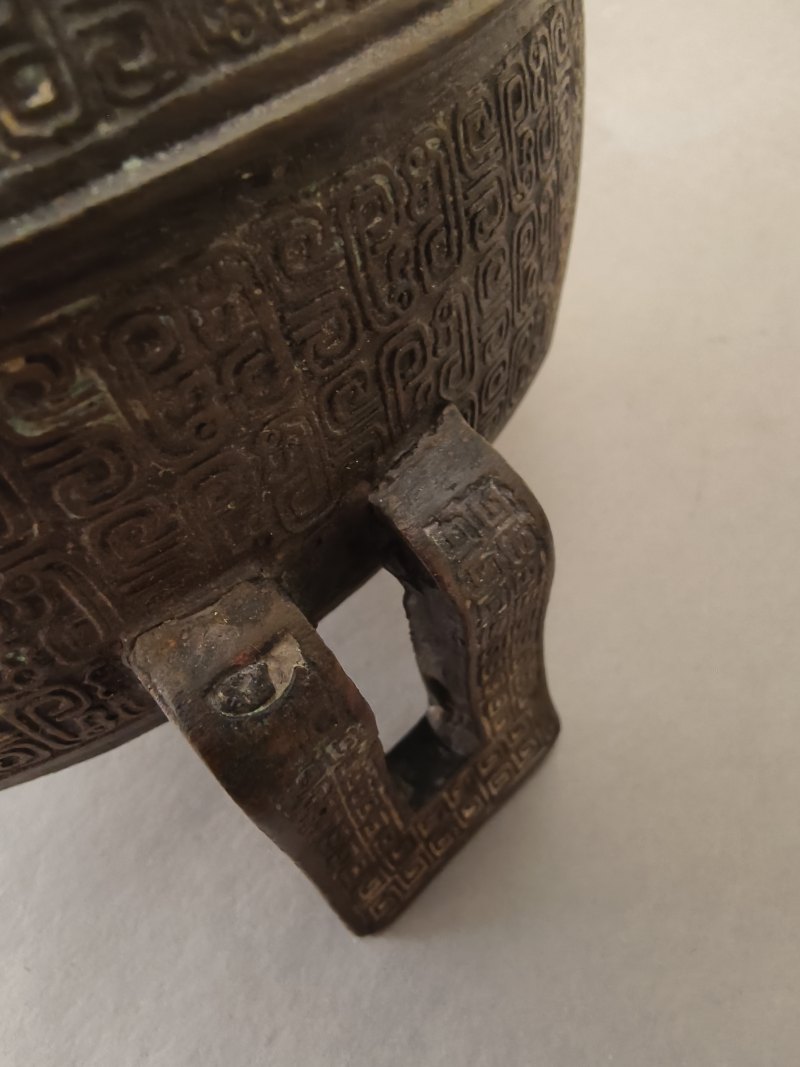 Three-legged bronze food vessel "ding" type - 图17