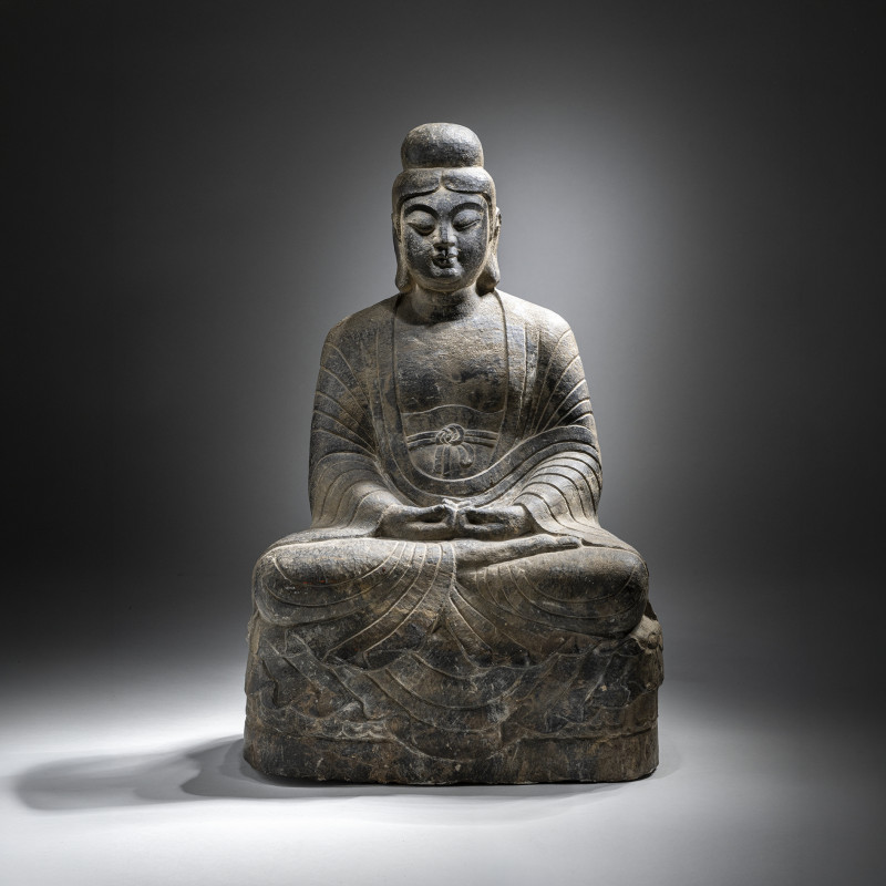 A LIMESTONE FIGURE OF BUDDHA SHAKYAMUNI