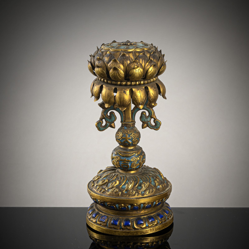 A Buddhist altar emblem made of fire-gilt copper with enamel decoration and lotus for incense sticks