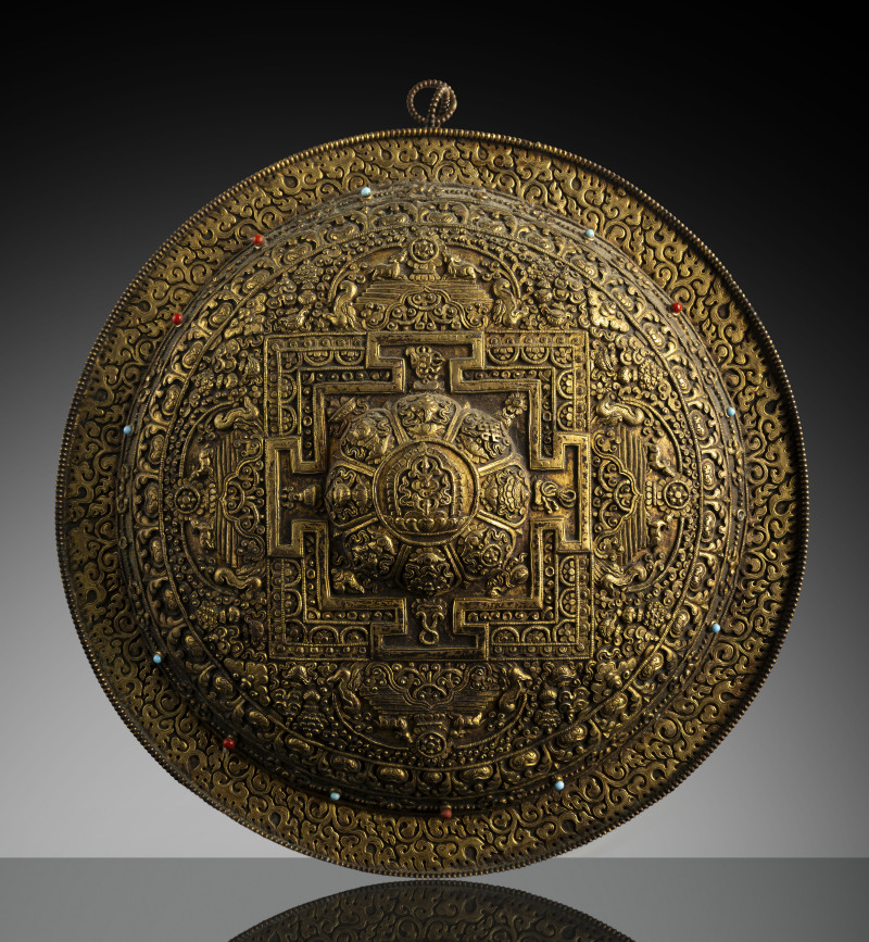 A PARCEL GILT-COPPER MANDALA