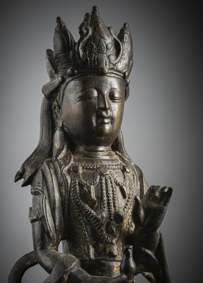 A bronze figure of Guanyin on a throne - 图4