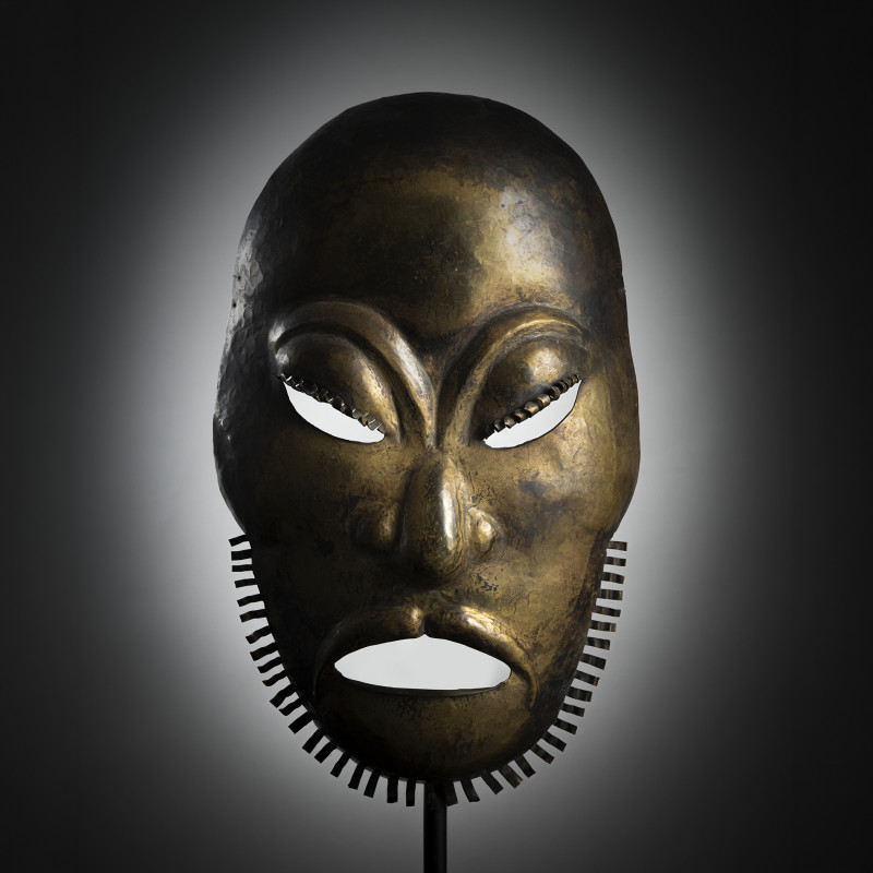 A metal ritual mask