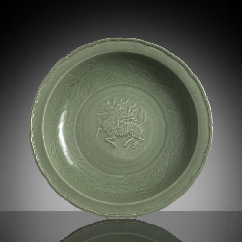 A floriform celadon qilin relief charger