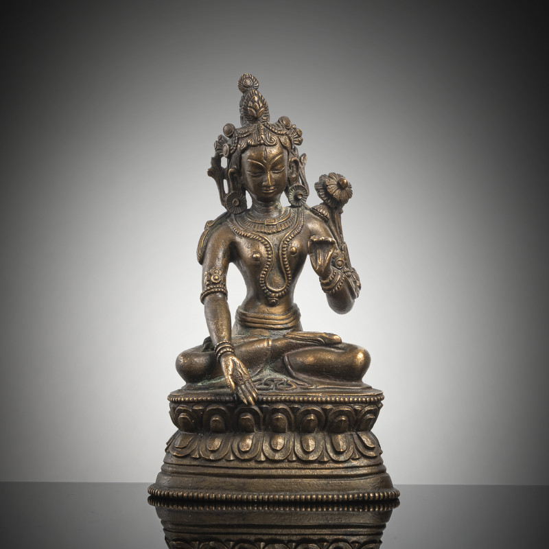 A BRONZE FIGURE OF A TARA