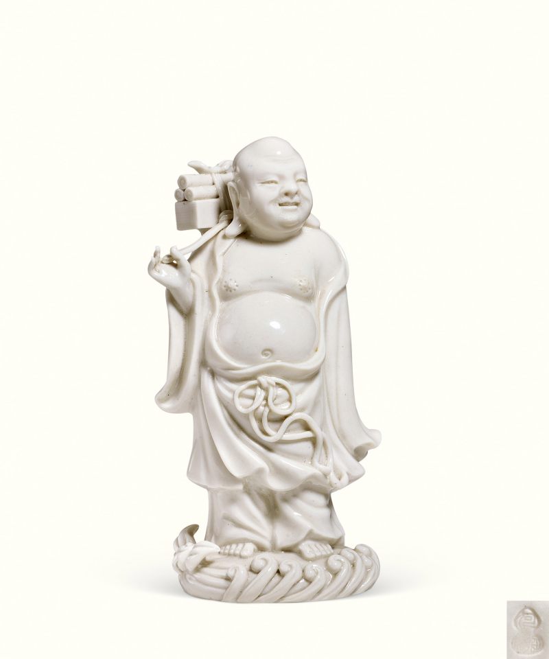 明 德化窑何朝宗款白釉布袋和尚立像