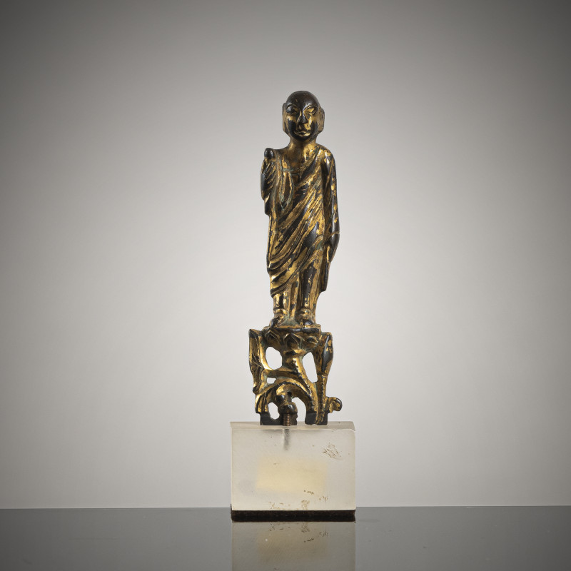 A GILT-BRONZE FIGURINE OF A LEHAN