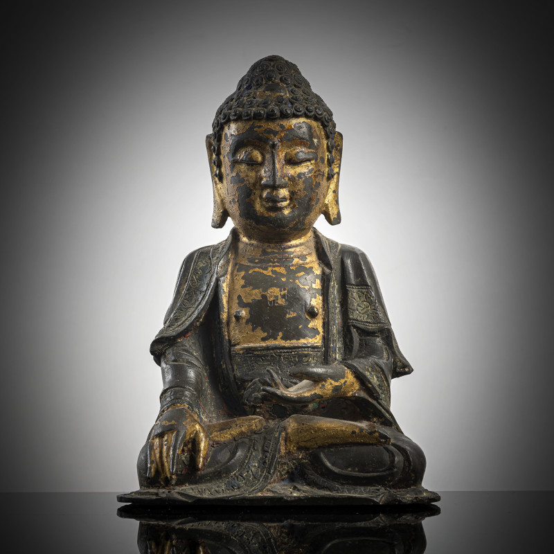 A part-gilt bronze of Buddha Shakyamuni in the meditation seat