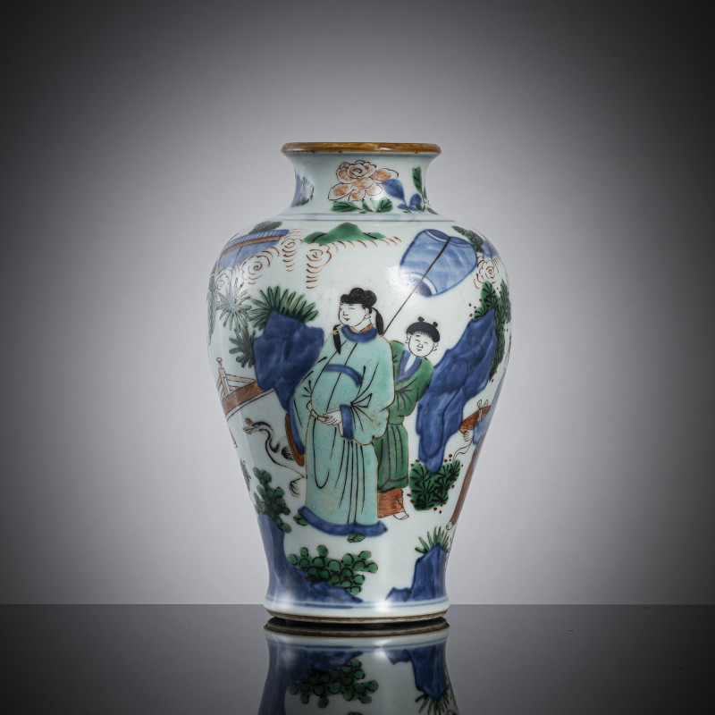 A 'wucai' porcelain vase with scholars