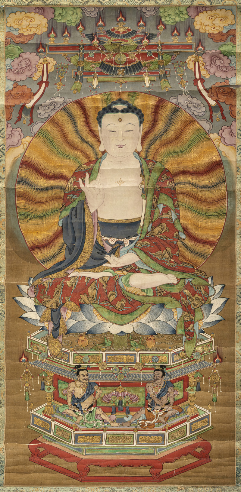 A Buddhist painting depicting Buddha Shakyamuni on a lotus throne