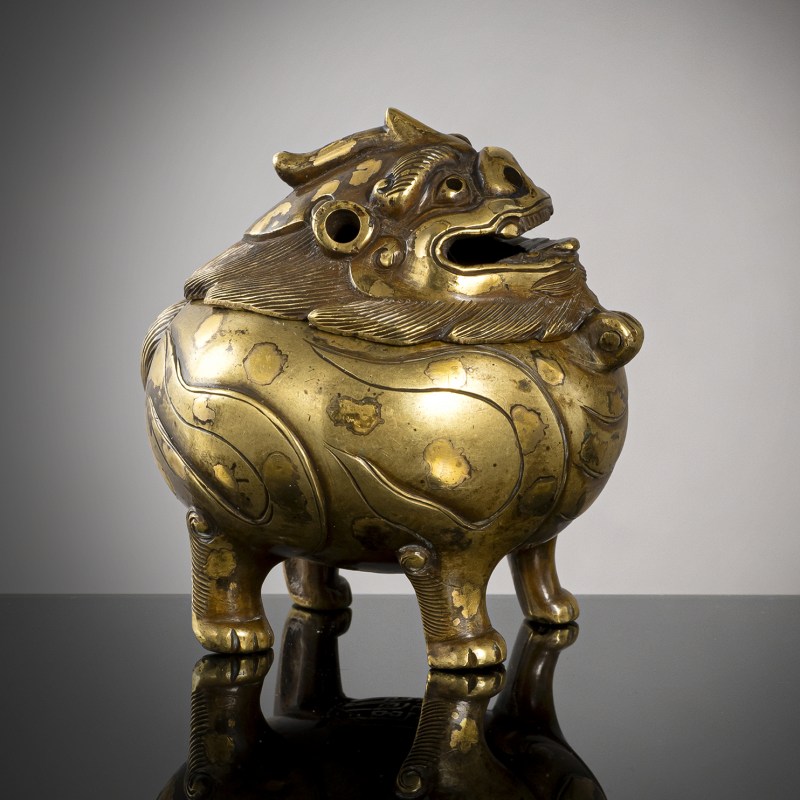 A small gold-splashed bronze censer in the shape of a Luduan