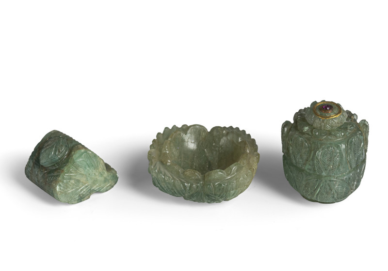 Two carved boxes and covers and a bowl made from emerald matrix