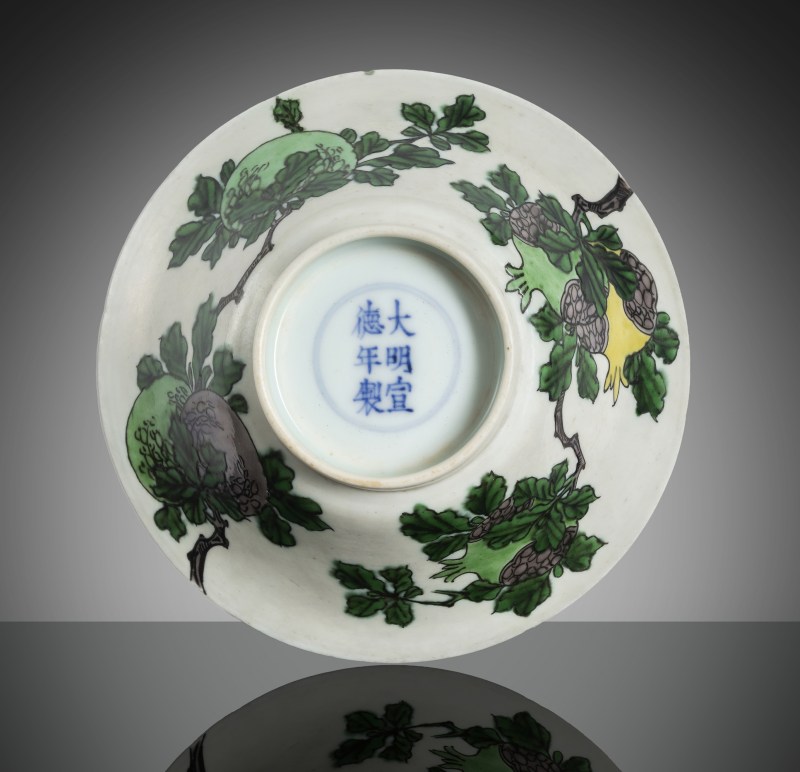 A 'Famille verte' biscuit porcelain bowl with 'Sanduo' decoration