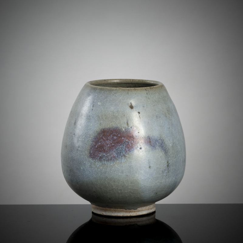 A lotus bud vase with Jun glaze and violet splashes