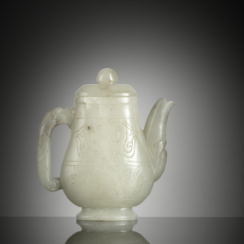 A small jade ewer with archaistic incised decoration