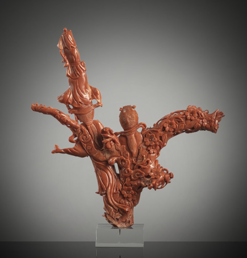 A coral carving of two figures - 图2